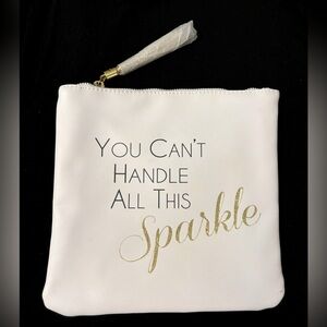 White makeup bag. Feaux leather. New. Never used.